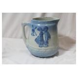 An Antique Stoneware Pitcher
