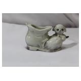 A Vintage Ceramic Shoe with Dog