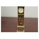 A Metal Grandfather Style Quartz Clock