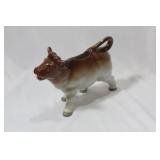 A Ceramic Cow Container