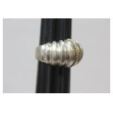 A Sterling and 14Karat Gold Ring