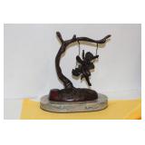 A Swinging Angel Sculpture