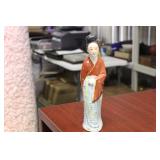 A Chinese Porcelain Figure of a Lady