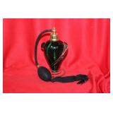 A Green Glass Parfume Bottle