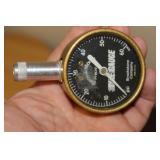 A Brookstone Company Tire Gauge
