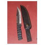 Knife with a Leather Sheath