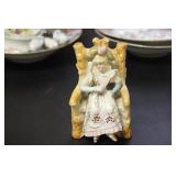 A Seated Ceramic Figure