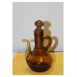 An Old Amber Glass Ewer