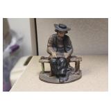 Cast Iron Man Sitting on the Bench