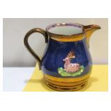 A Ceramic Lusterware Creamer