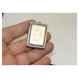 A Sterling Locket Pendant