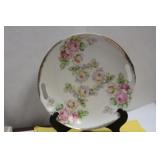 An Antique Rose Plate
