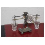 Silver or Silverplate Vintage Man on Wheels