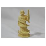 A Carved Bone Chess Piece