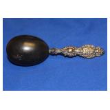 A Sterling Handle Wooden Sock Darner