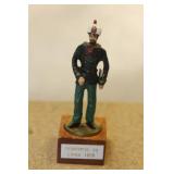 Metal Soldier on Wooden Stand