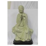 A Lohan-style Figurine on Stand