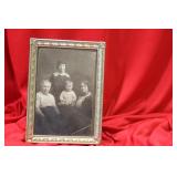 An Old Framed Black And White Photo