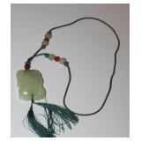 A Chinese Jade / Hardstone Movable Pendant