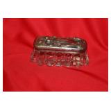 An Ornate Glass Container