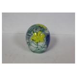 A Signed Paperweight