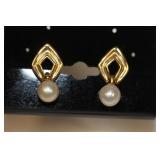 A Pair of 14 Karat Gold Earrings