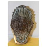 A Bronze Indian Clip