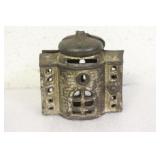 An Old Cast Iron Coin Bank