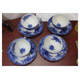 A Burslem Flow Blue Cup and Saucer