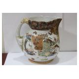 A Japanese Porcelain Pitcher