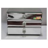 A Mirrored Jewelry Cabinet