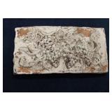 A Ceramic / Clay Plaque Raised or Embossed Design