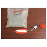 A Bag of Fishing Weights and a Lure