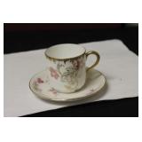 A Limoge Dematesse Cup And Saucer