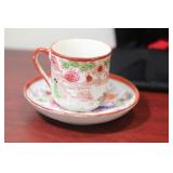 A Japanese Geisha Girl Cup and Saucer