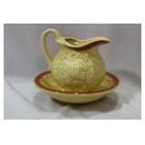 A Ceramic Pitcher and Undertray