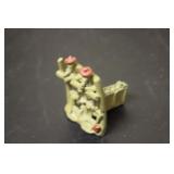 A Cast Iron or Solid Metal Oriental Motif Man