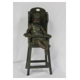 A Bronze Child on a High Chair by Steiner