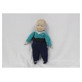 A Porcelain Jointed Doll