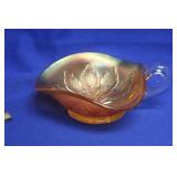A Carnival Glass One Handle Bowl