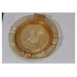 An Iridescent Glass Ashtray With Match Holder