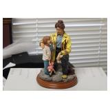 Red Hat of Courage Figurine