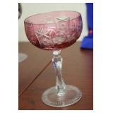 A Cranberry Cut Glass Wine Goblet