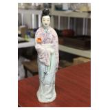 A Chinese Porcelain Figure of a Lady
