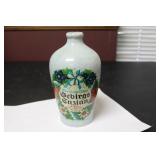 A German Pitcher with Miniature Mug