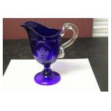 A Blue Glass Pitcher