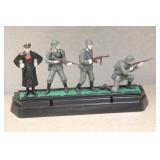 Metal Toy Soldiers on Plastic Stand