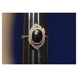 A Sterling and Onyx Ring