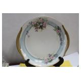 An Antique Rose Plate