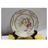 An Antique Rose Plate